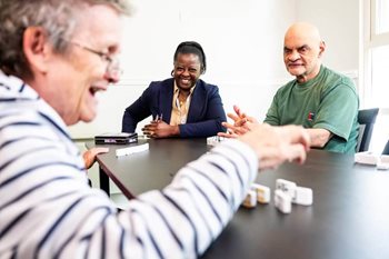 When should someone with dementia go into a care home?